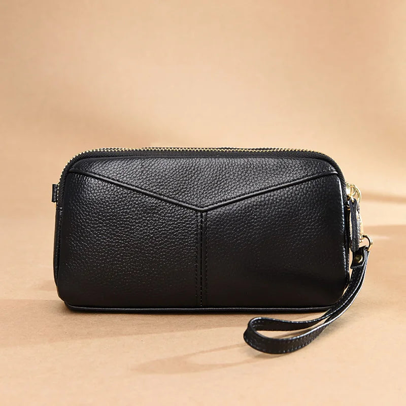 Title / Titre
EN: Genuine Leather Women’s Tote Shoulder Bag – Solid Color Clutch Handbag
FR: Sac à main en cuir véritable pour femme – Cabas bandoulière uni