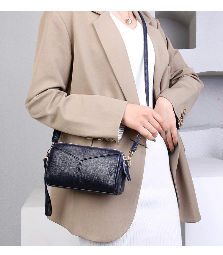 Title / Titre
EN: Genuine Leather Women’s Tote Shoulder Bag – Solid Color Clutch Handbag
FR: Sac à main en cuir véritable pour femme – Cabas bandoulière uni