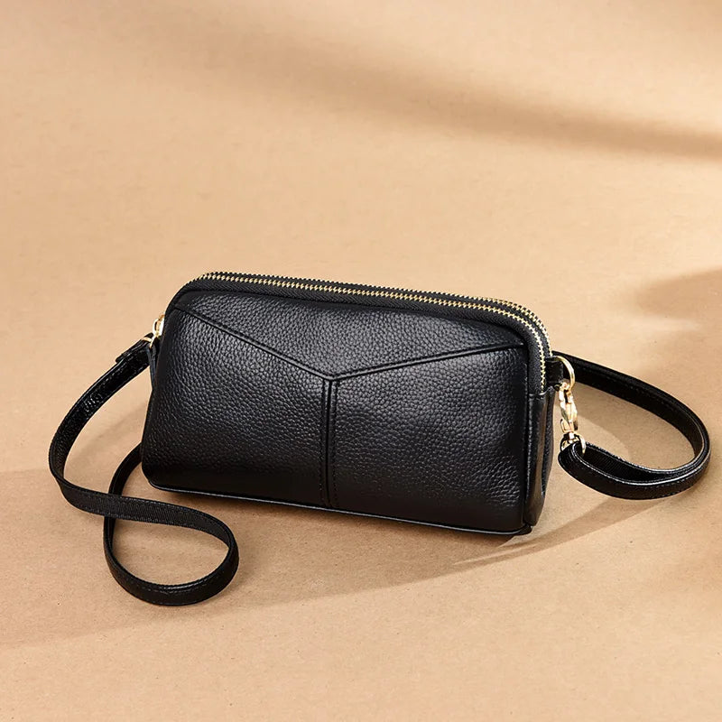 Title / Titre
EN: Genuine Leather Women’s Tote Shoulder Bag – Solid Color Clutch Handbag
FR: Sac à main en cuir véritable pour femme – Cabas bandoulière uni