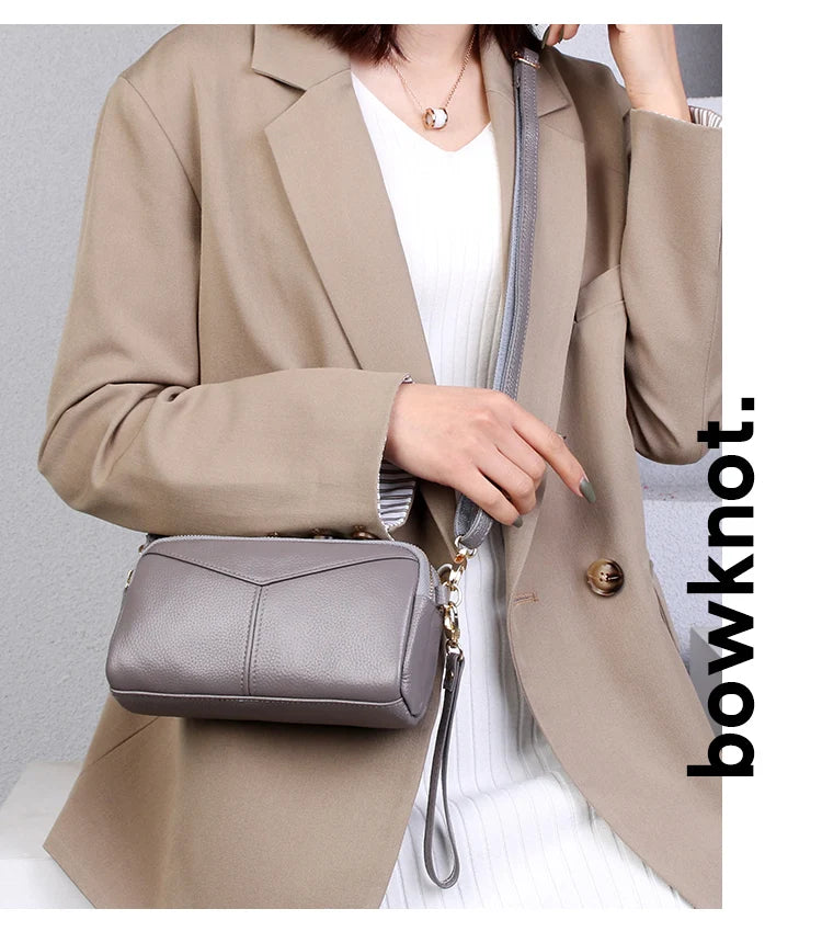 Title / Titre
EN: Genuine Leather Women’s Tote Shoulder Bag – Solid Color Clutch Handbag
FR: Sac à main en cuir véritable pour femme – Cabas bandoulière uni