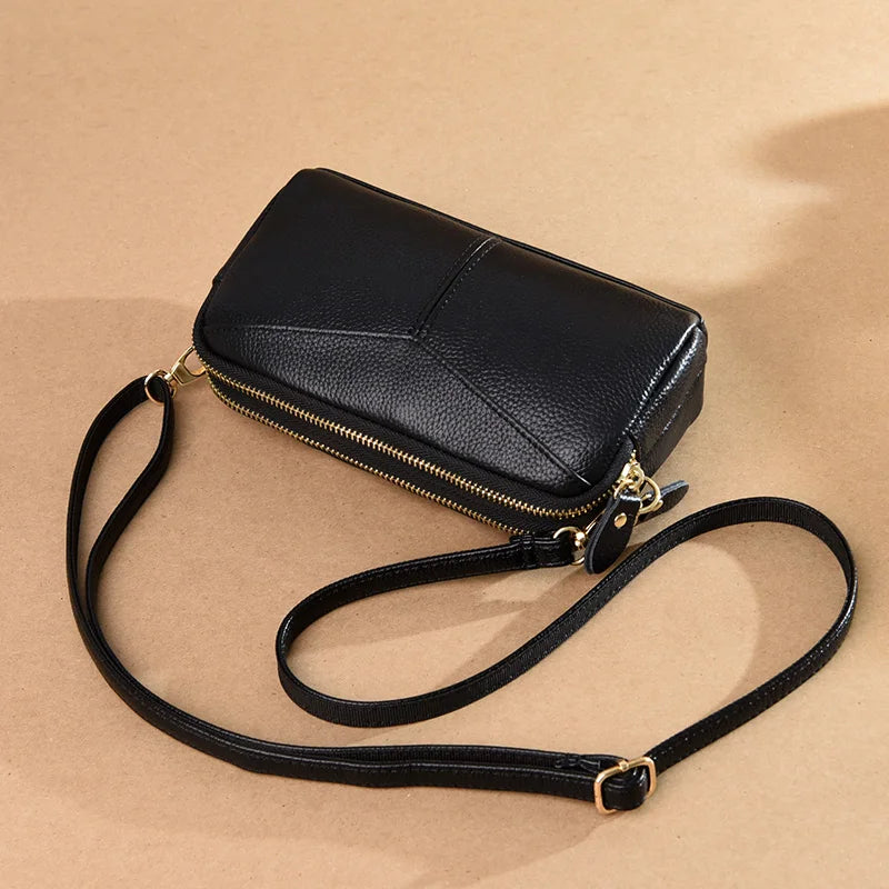 Title / Titre
EN: Genuine Leather Women’s Tote Shoulder Bag – Solid Color Clutch Handbag
FR: Sac à main en cuir véritable pour femme – Cabas bandoulière uni