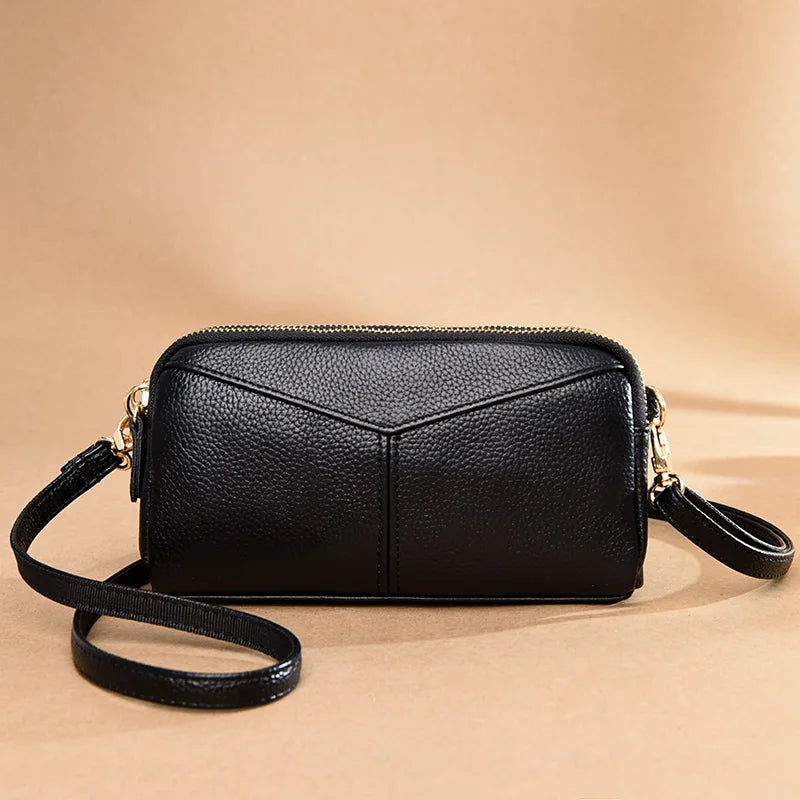 Title / Titre
EN: Genuine Leather Women’s Tote Shoulder Bag – Solid Color Clutch Handbag
FR: Sac à main en cuir véritable pour femme – Cabas bandoulière uni