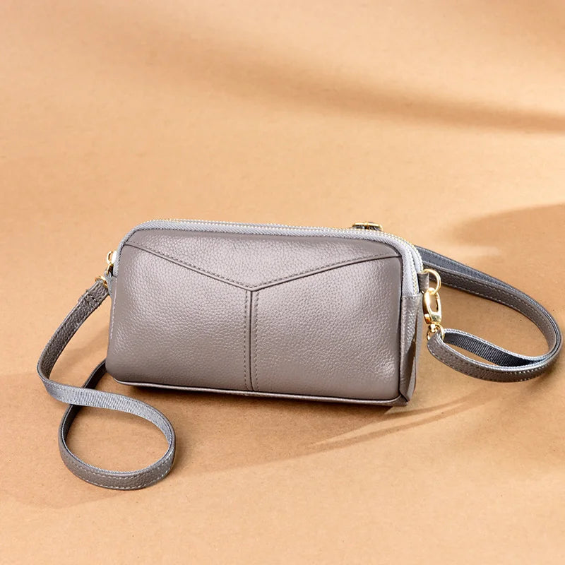 Title / Titre
EN: Genuine Leather Women’s Tote Shoulder Bag – Solid Color Clutch Handbag
FR: Sac à main en cuir véritable pour femme – Cabas bandoulière uni