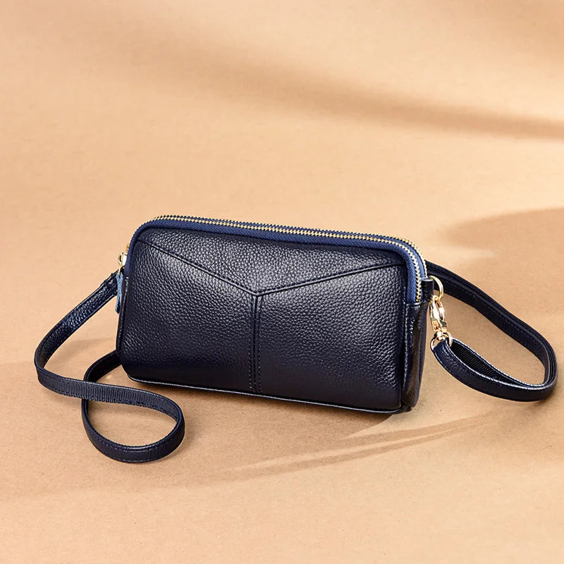 Title / Titre
EN: Genuine Leather Women’s Tote Shoulder Bag – Solid Color Clutch Handbag
FR: Sac à main en cuir véritable pour femme – Cabas bandoulière uni