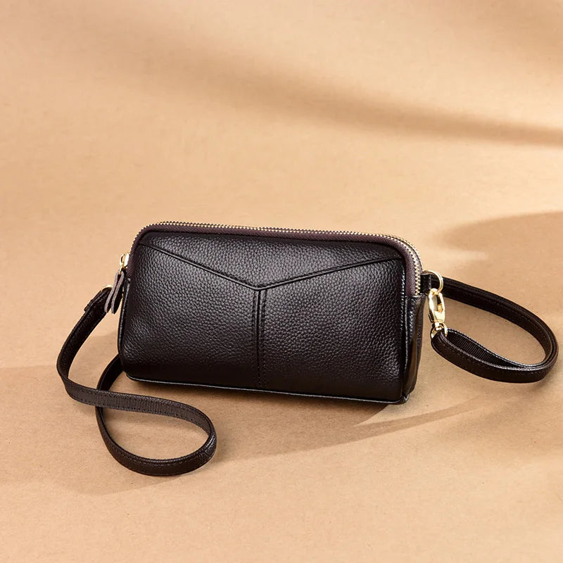 Title / Titre
EN: Genuine Leather Women’s Tote Shoulder Bag – Solid Color Clutch Handbag
FR: Sac à main en cuir véritable pour femme – Cabas bandoulière uni