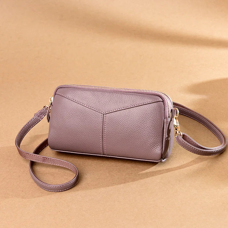 Title / Titre
EN: Genuine Leather Women’s Tote Shoulder Bag – Solid Color Clutch Handbag
FR: Sac à main en cuir véritable pour femme – Cabas bandoulière uni