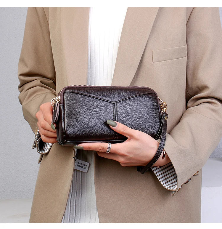Title / Titre
EN: Genuine Leather Women’s Tote Shoulder Bag – Solid Color Clutch Handbag
FR: Sac à main en cuir véritable pour femme – Cabas bandoulière uni